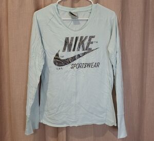 Nike Women's Light Blue Long Sleeve Sportswear Tee
